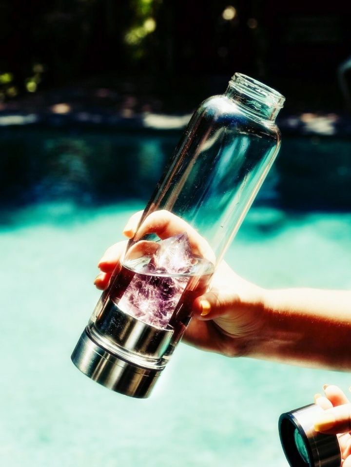 Image of Amethyst water bottle used to enhance water. Naan, Naan Design, Naandesign