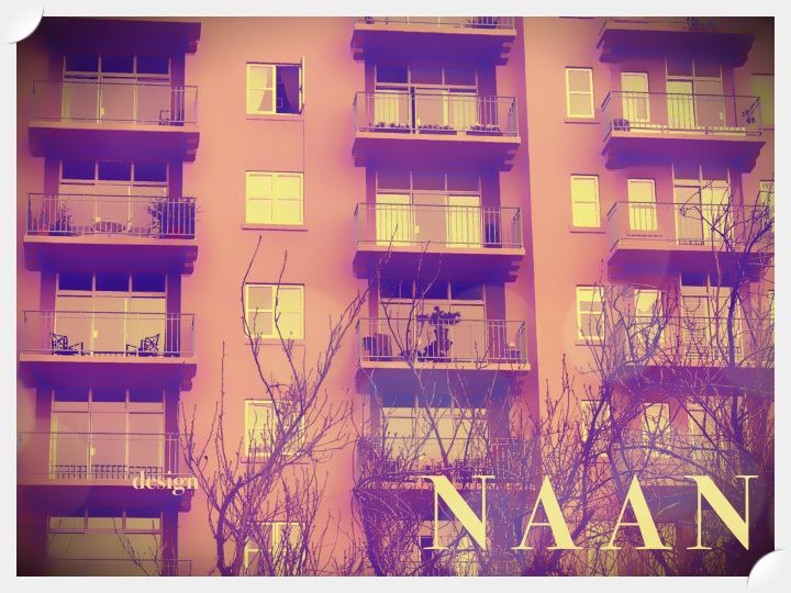 Image of Multi-Story Condo Building With Balconies.  Naan Design.  Naandesign.