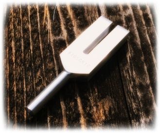 crystal tuning fork on a table