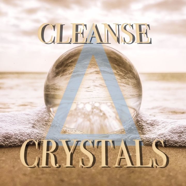 Crystal sphere being washed in the ocean waves